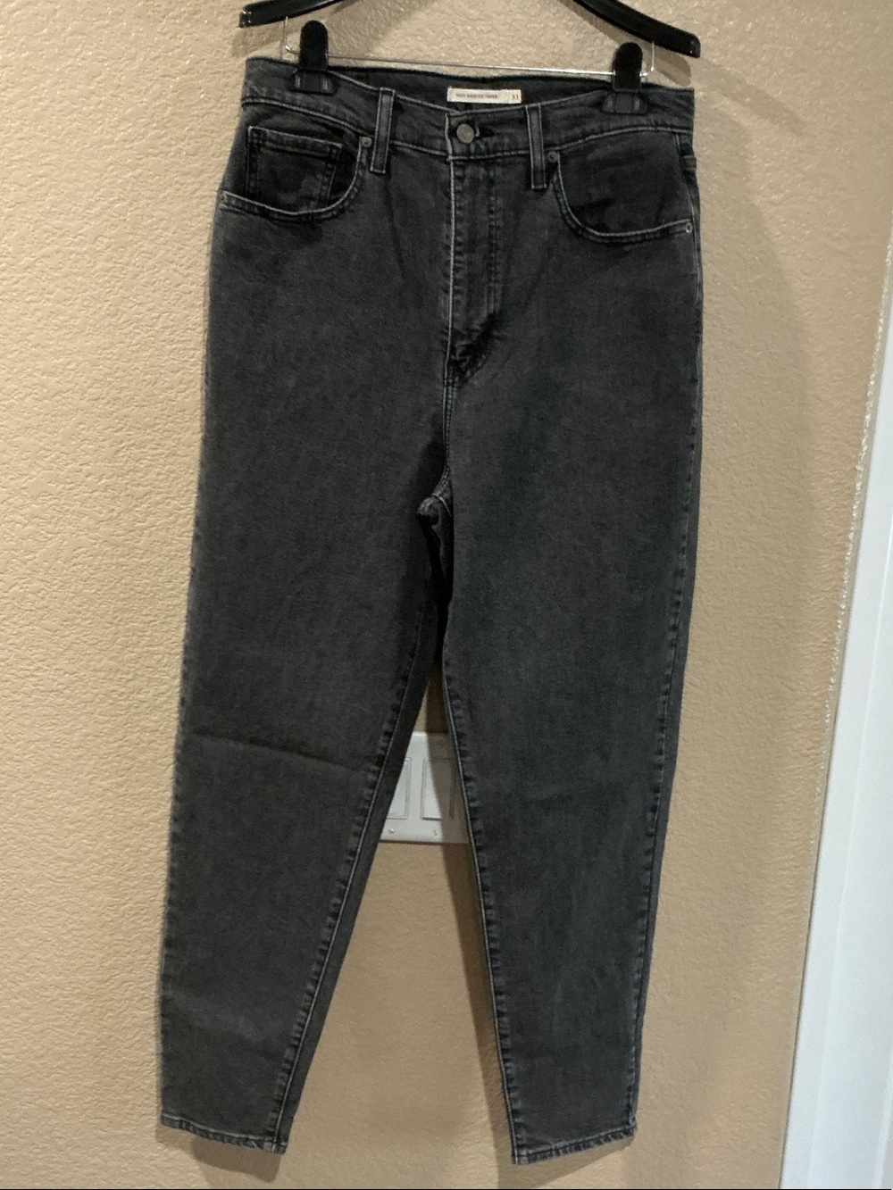 Levi's High-Rise Tapered Jeans in Washed Black